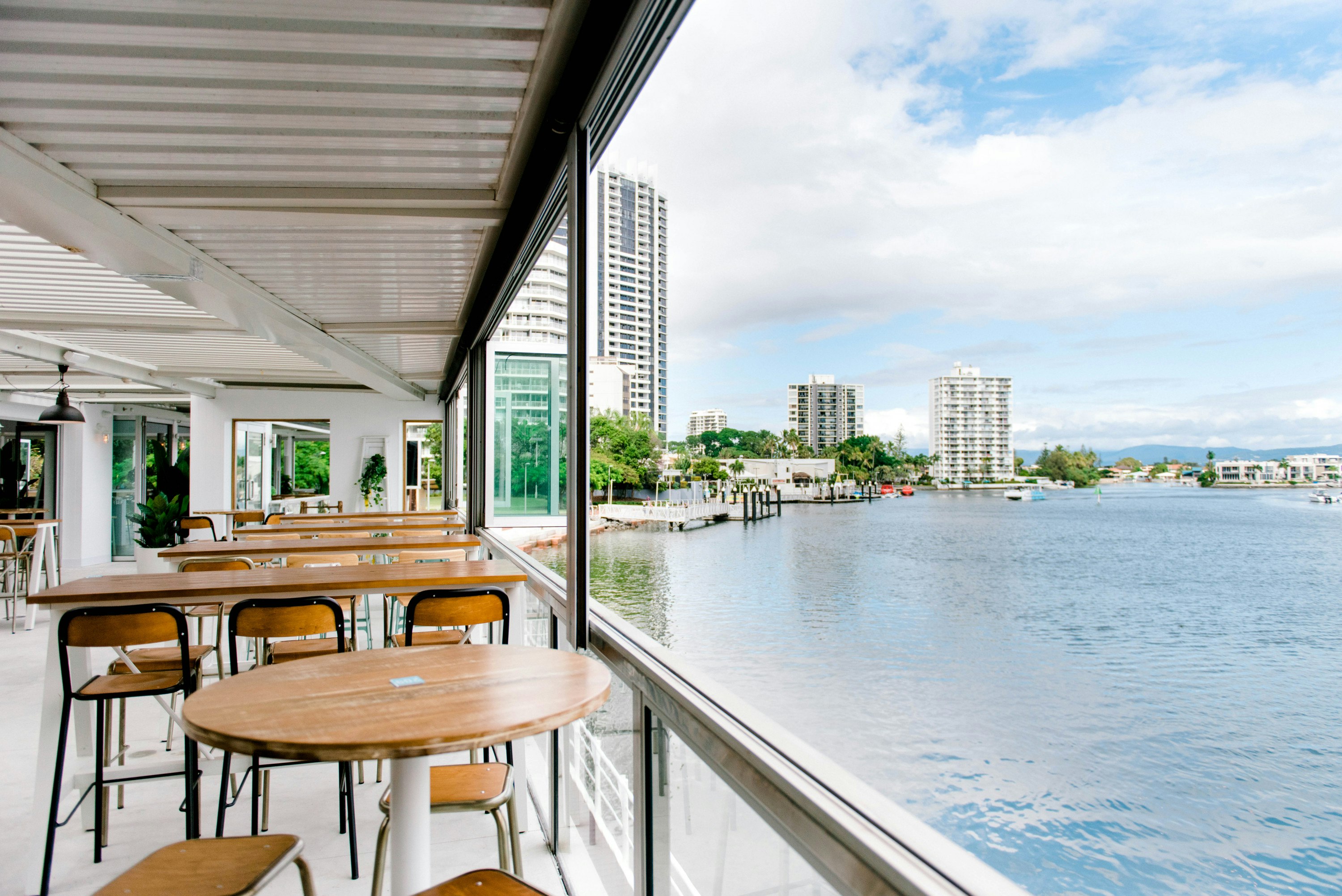 a table next to the water at a waterfront venue